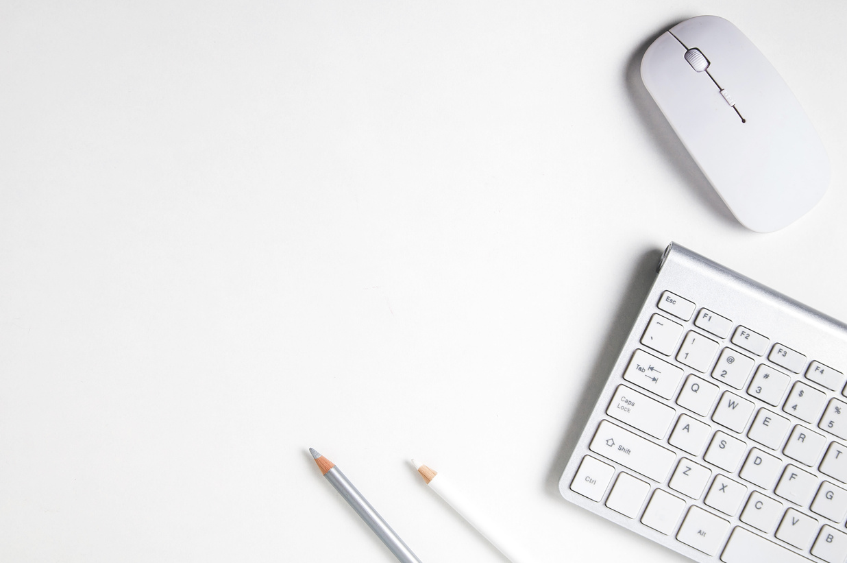 White computer mouse and keyboard on white background